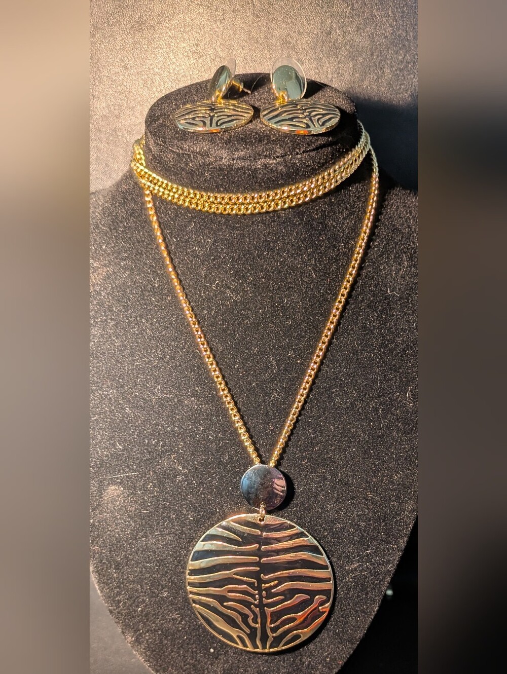 Gold-Tone Layered Zebra Pendant Necklace And Matching Earrings